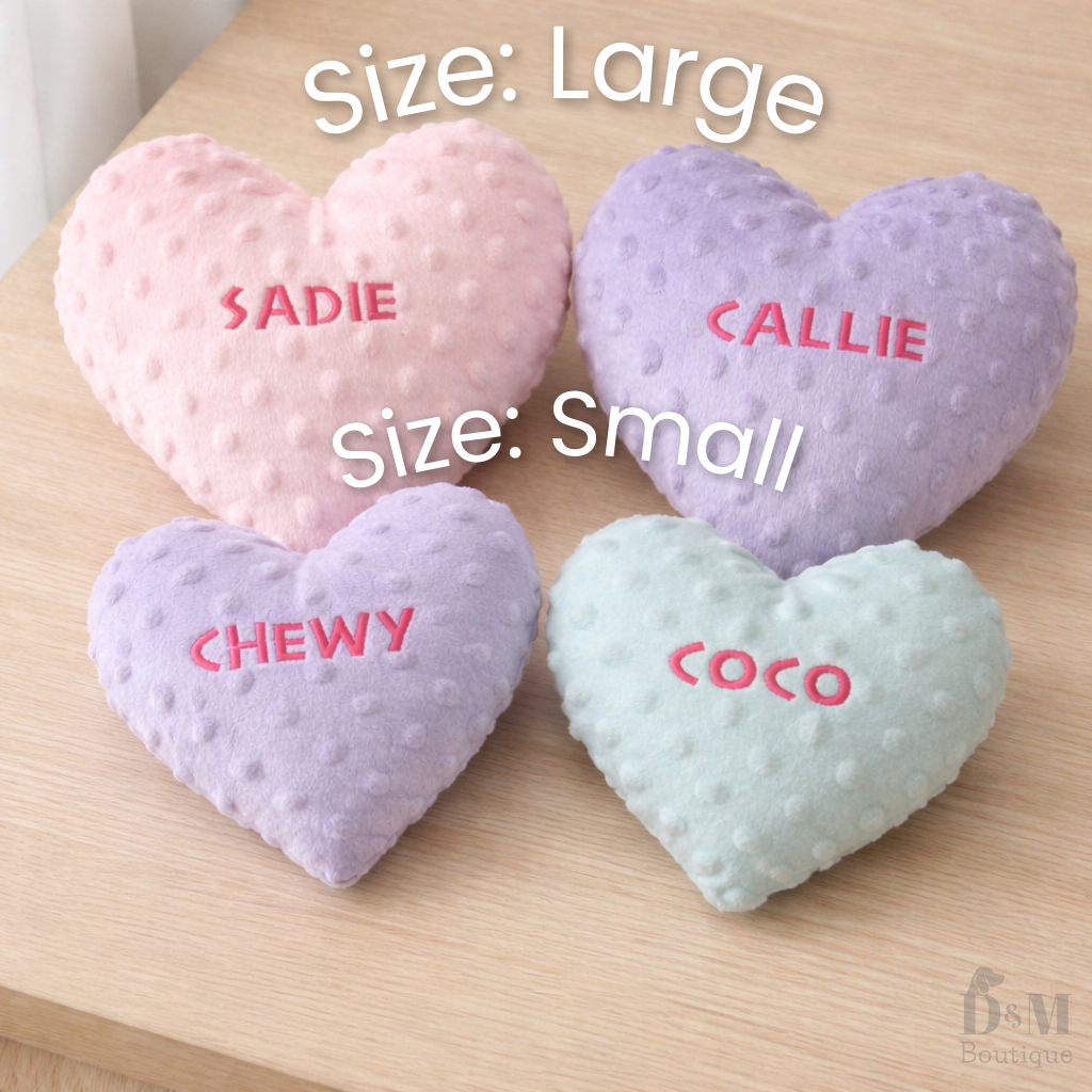 Heart-shaped plush toys showcasing large vs small size