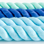 Close-up of a blue and green rope on a white background